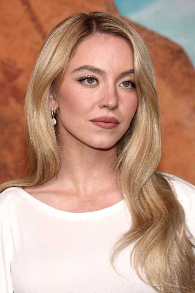 Busty Sydney Sweeney Stuns in Skintight White Mini That’s Pure Sin at Euphoria S3 Premiere Gallery