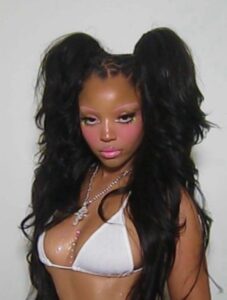 "Chloe Bailey Shines in Sparkling Outfit and Neon Jeans: A Stunning Fashion Moment" 6