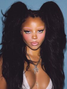 "Chloe Bailey Shines in Sparkling Outfit and Neon Jeans: A Stunning Fashion Moment" 9