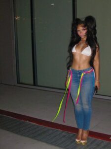 "Chloe Bailey Shines in Sparkling Outfit and Neon Jeans: A Stunning Fashion Moment" 10