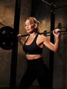 "Hilary Duff Showcases Stunning Abs and Toned Rear in Striking Ladder Photoshoot" 10