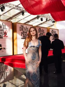 "Madelaine Petsch Stuns with Eye-Catching Curves and Cleavage Next to Opulent Maybach" 14