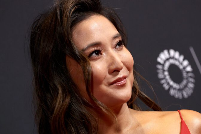 New Ashley Park Flashes Major Cleavage in That Tight Red Gown at Emily in Paris Screening Photos