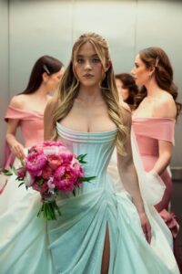 "Sydney Sweeney Dazzles in Figure-Hugging Wedding Dress, Showcasing Stunning Cleavage in Euphoria" 4