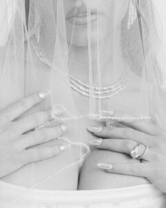 "Sydney Sweeney Dazzles in Figure-Hugging Wedding Dress, Showcasing Stunning Cleavage in Euphoria" 15