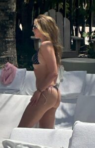 "Tate McRae Stuns in Daring String Bikini by the Pool in Miami" 3