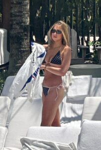 "Tate McRae Stuns in Daring String Bikini by the Pool in Miami" 6