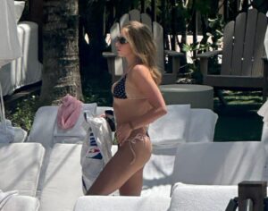 "Tate McRae Stuns in Daring String Bikini by the Pool in Miami" 7