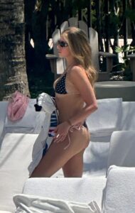 "Tate McRae Stuns in Daring String Bikini by the Pool in Miami" 15