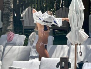 "Tate McRae Stuns in Daring String Bikini by the Pool in Miami" 16