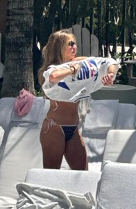 "Tate McRae Stuns in Daring String Bikini by the Pool in Miami" 20