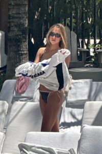 "Tate McRae Stuns in Daring String Bikini by the Pool in Miami" 21