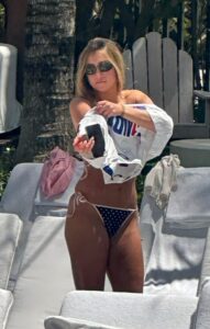 "Tate McRae Stuns in Daring String Bikini by the Pool in Miami" 23