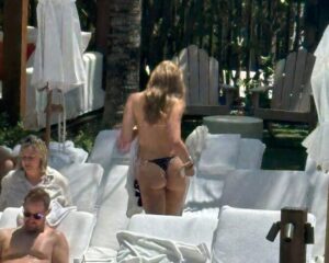 "Tate McRae Stuns in Daring String Bikini by the Pool in Miami" 24