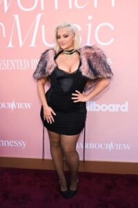 "Bebe Rexha Dazzles in Bold Red Carpet Look, Flaunting Her Curvy Figure and Stunning Assets" 2