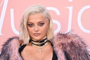"Bebe Rexha Dazzles in Bold Red Carpet Look, Flaunting Her Curvy Figure and Stunning Assets" 5