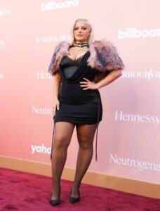 "Bebe Rexha Dazzles in Bold Red Carpet Look, Flaunting Her Curvy Figure and Stunning Assets" 12