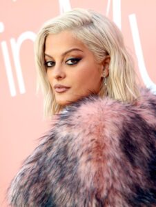 "Bebe Rexha Dazzles in Bold Red Carpet Look, Flaunting Her Curvy Figure and Stunning Assets" 17