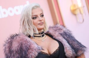 "Bebe Rexha Dazzles in Bold Red Carpet Look, Flaunting Her Curvy Figure and Stunning Assets" 20
