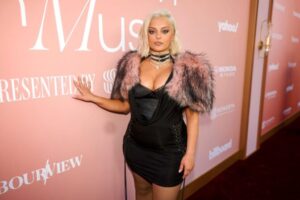 "Bebe Rexha Dazzles in Bold Red Carpet Look, Flaunting Her Curvy Figure and Stunning Assets" 22