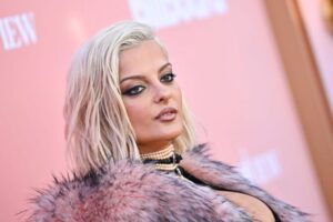 "Bebe Rexha Dazzles in Bold Red Carpet Look, Flaunting Her Curvy Figure and Stunning Assets" 24