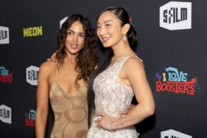 "Eiza Gonzalez Dazzles in Figure-Hugging Gold Dress at SF Film Fest, Showcasing Bold Braless Look" 8