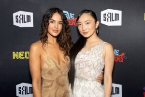 "Eiza Gonzalez Dazzles in Figure-Hugging Gold Dress at SF Film Fest, Showcasing Bold Braless Look" 10