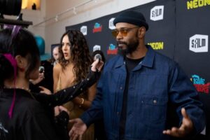 "Eiza Gonzalez Dazzles in Figure-Hugging Gold Dress at SF Film Fest, Showcasing Bold Braless Look" 14