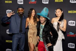"Eiza Gonzalez Dazzles in Figure-Hugging Gold Dress at SF Film Fest, Showcasing Bold Braless Look" 17