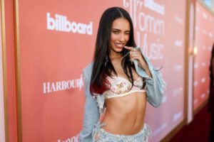 "Kylie Cantrall Turns Heads in Figure-Hugging Denim and Lace at Billboard Event" 1