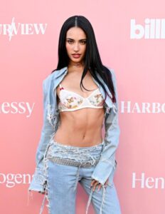 "Kylie Cantrall Turns Heads in Figure-Hugging Denim and Lace at Billboard Event" 4