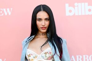 "Kylie Cantrall Turns Heads in Figure-Hugging Denim and Lace at Billboard Event" 11
