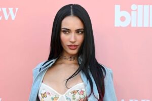 "Kylie Cantrall Turns Heads in Figure-Hugging Denim and Lace at Billboard Event" 12