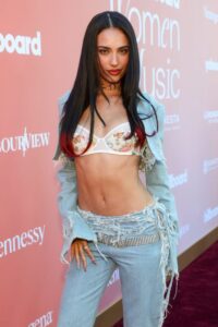 "Kylie Cantrall Turns Heads in Figure-Hugging Denim and Lace at Billboard Event" 15