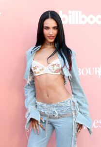 "Kylie Cantrall Turns Heads in Figure-Hugging Denim and Lace at Billboard Event" 16