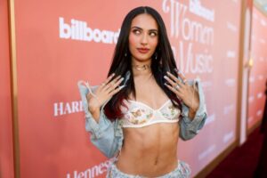 "Kylie Cantrall Turns Heads in Figure-Hugging Denim and Lace at Billboard Event" 19