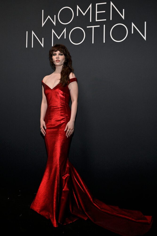 Sophie Thatcher Dazzles in a Gorgeous Red Dress at the 2026 Kering Women In Motion Gala