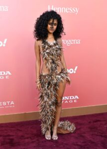 "Tyla Stuns in Daring Feather Ensemble, Showcasing Her Flawless Figure at Billboard Women in Music Event" 23