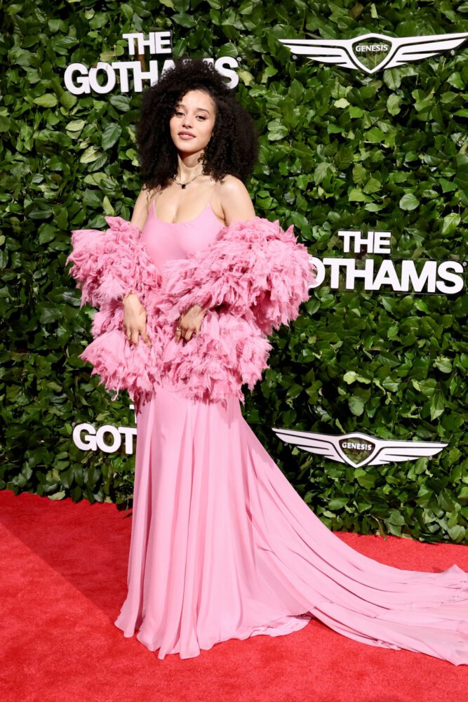 Chase Infiniti Turns Heads in Daring Pink Slip Dress, Showcasing Stunning Cleavage