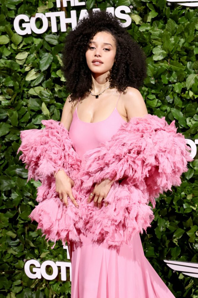Chase Infiniti Turns Heads in Daring Pink Slip Dress, Showcasing Stunning Cleavage