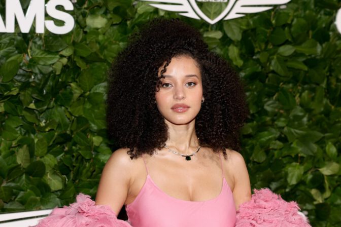 Chase Infiniti Turns Heads in Daring Pink Slip Dress, Showcasing Stunning Cleavage