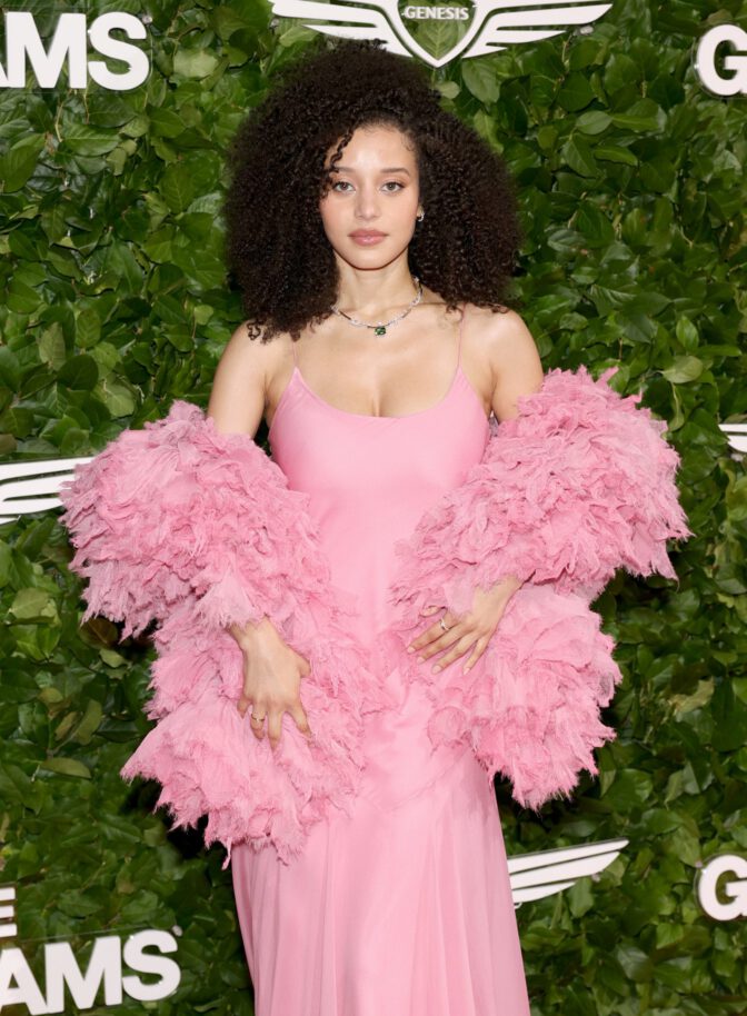 Chase Infiniti Turns Heads in Daring Pink Slip Dress, Showcasing Stunning Cleavage