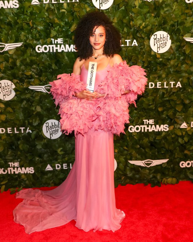 Chase Infiniti Turns Heads in Daring Pink Slip Dress, Showcasing Stunning Cleavage