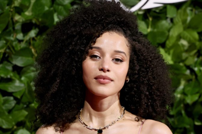 Chase Infiniti Turns Heads in Daring Pink Slip Dress, Showcasing Stunning Cleavage