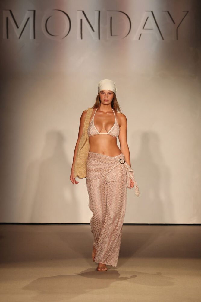 Jayde Pollard Turns Heads with Stunning Cleavage in Daring Plunging Bikini at Monday Swimwear Showcase
