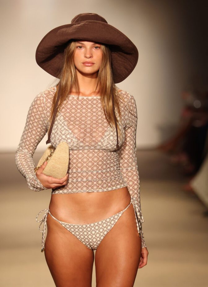 Jayde Pollard Turns Heads with Stunning Cleavage in Daring Plunging Bikini at Monday Swimwear Showcase
