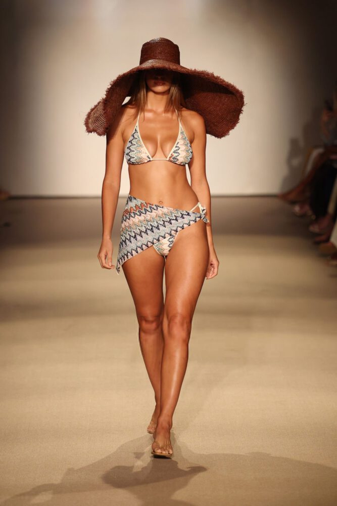 Jayde Pollard Turns Heads with Stunning Cleavage in Daring Plunging Bikini at Monday Swimwear Showcase