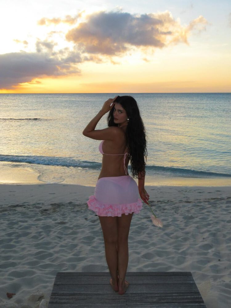 Kylie Jenner Flaunts Stunning Curves in Tiny Pink Bikini During Dreamy Sunset Beach Escape