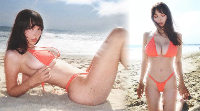 Sophie Mudd's Huge Tits Spill from Tiny Orange Bikini on Sizzling Beach Sand