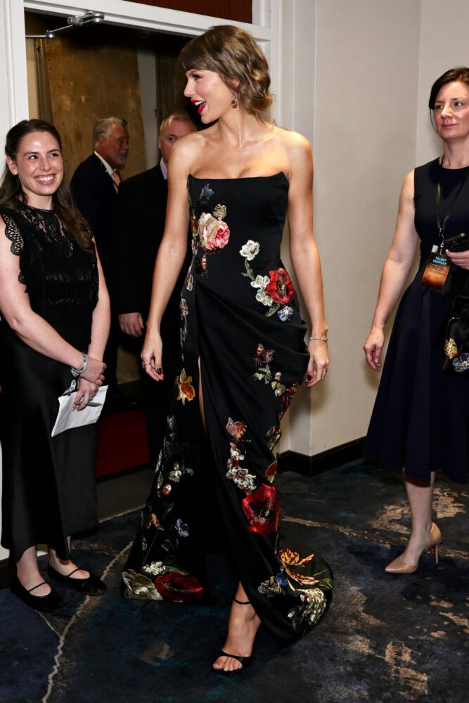 Taylor Swift Flaunts Busty Cleavage And Mile-High Legs In Sizzling Slit Gown At Awards Gala